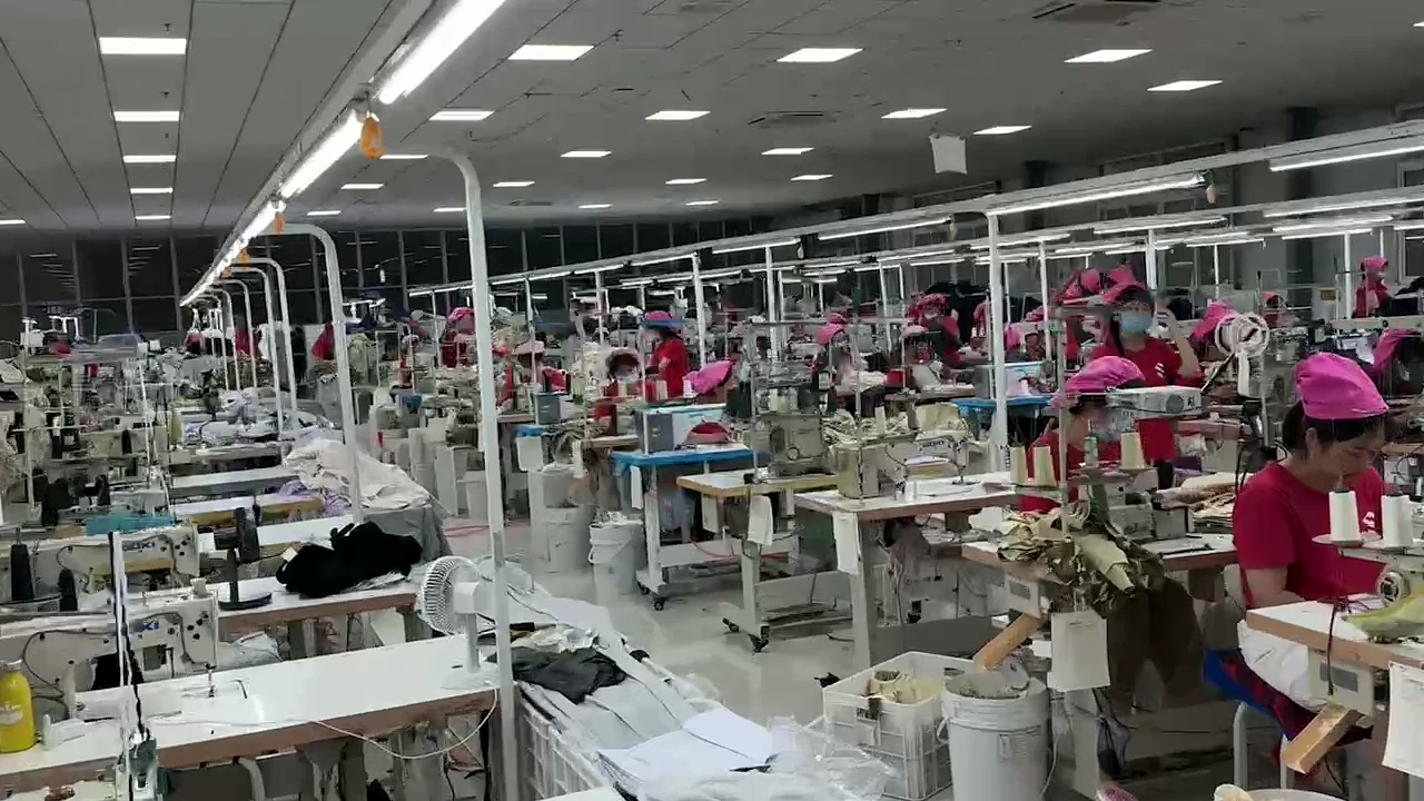 Active garment sewing lines on the production floor